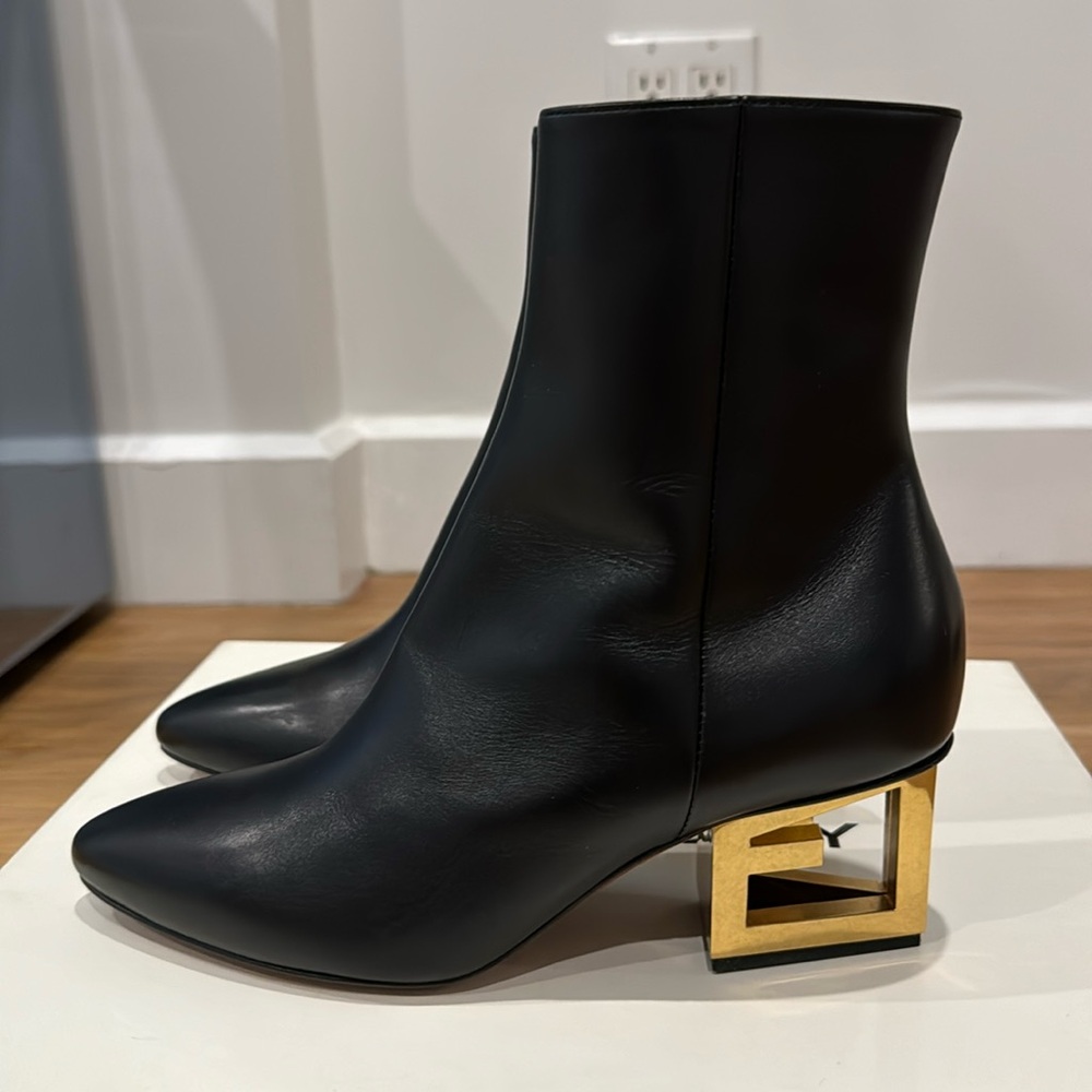 Givenchy logo-plaque leather boots in 2.25” heels